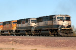 The three SD70MACs on the arse-end of this e/b Light Power Move supposedly 
came over to the BNSF from the UP in Phoenix...that is direct from a BNSF buddy of mine